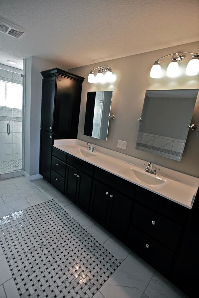 This is an example of a mid-sized transitional master bathroom in Chicago with an integrated sink, shaker cabinets, dark wood cabinets, an open shower, white tile, ceramic tile and ceramic floors.