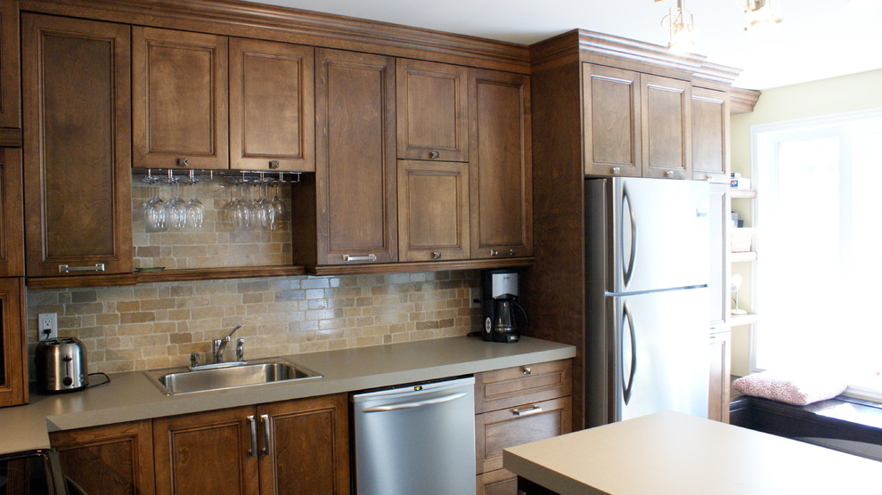 Eat-in kitchen - small transitional eat-in kitchen idea with a drop-in sink, shaker cabinets, brown cabinets, laminate countertops, multicolored backsplash, stone slab backsplash, stainless steel appliances and an island