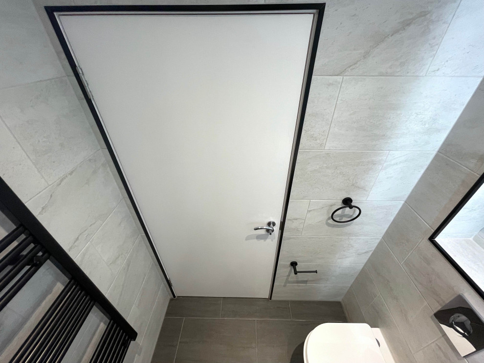 Photo of a small modern shower room bathroom in London with a floating vanity unit.
