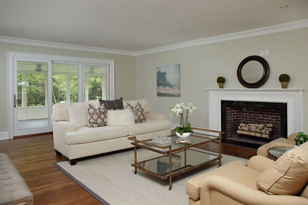 Large traditional formal open concept living room in Boston with beige walls, a standard fireplace, a stone fireplace surround, light hardwood floors, no tv and beige floor.