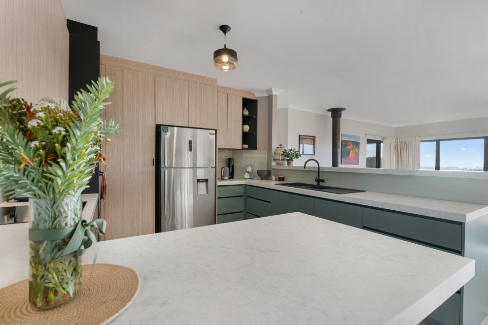 This is an example of a mid-sized contemporary kitchen in Adelaide.