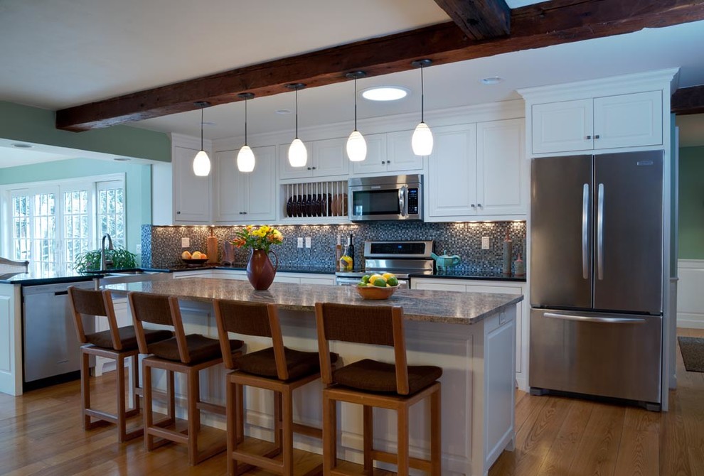 Inspiration for a large transitional open concept kitchen remodel in Boston with flat-panel cabinets and an island