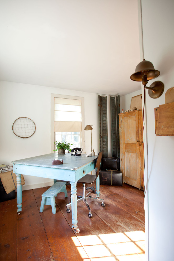 Inspiration for a traditional home office in Boston with white walls, medium hardwood floors and a freestanding desk.