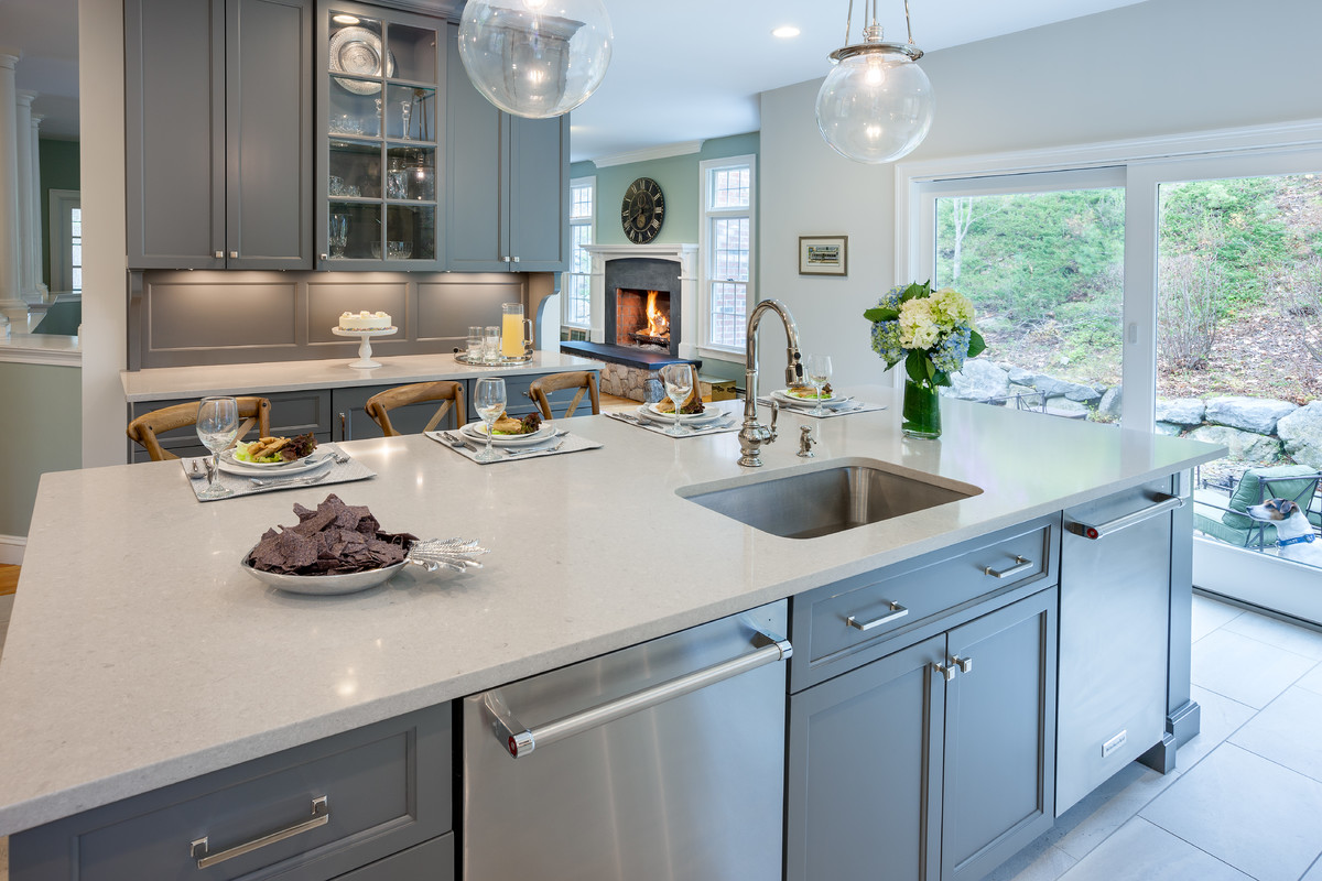Transitional kitchen photo in Boston with an undermount sink, gray cabinets, quartzite countertops and stainless steel appliances