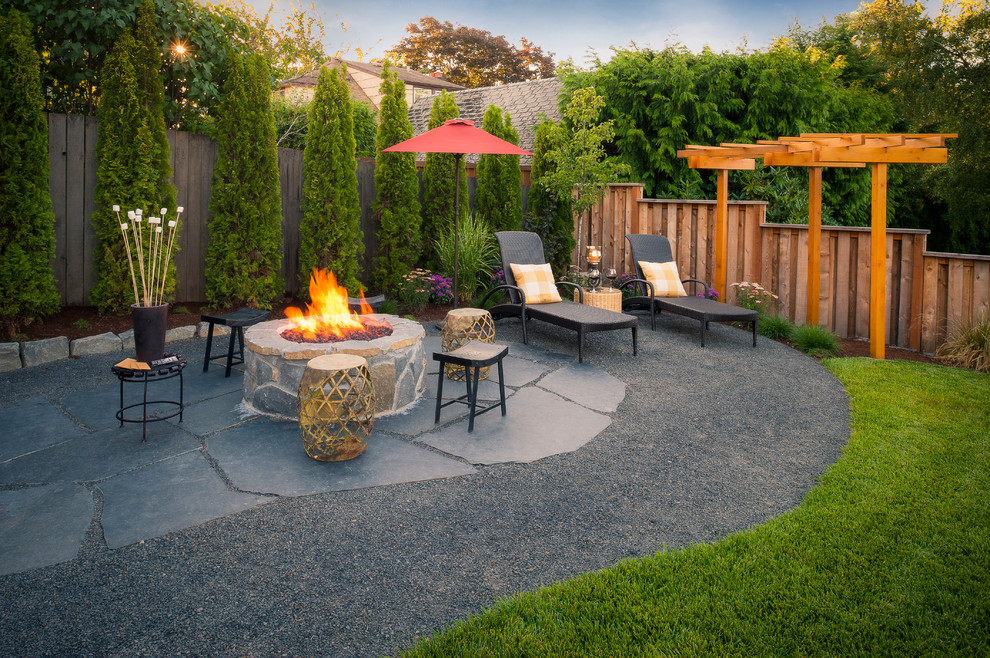 Inspiration for a traditional backyard patio in Portland.