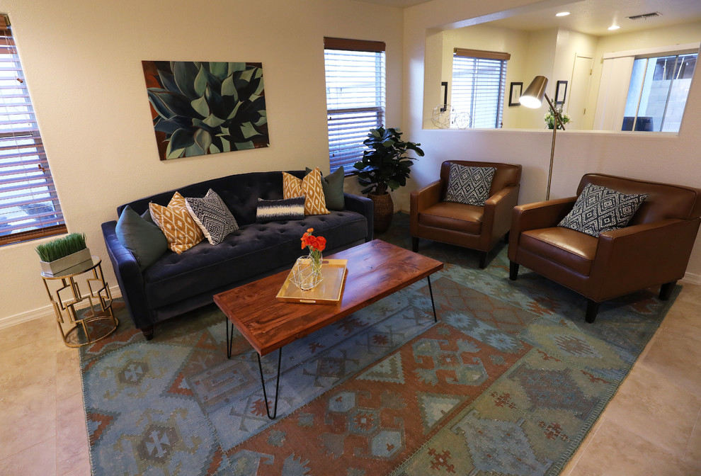Example of a transitional home design design in Phoenix