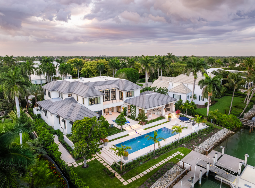 Example of a transitional exterior home design in Miami