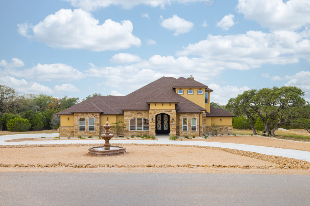 Example of a transitional exterior home design in Austin