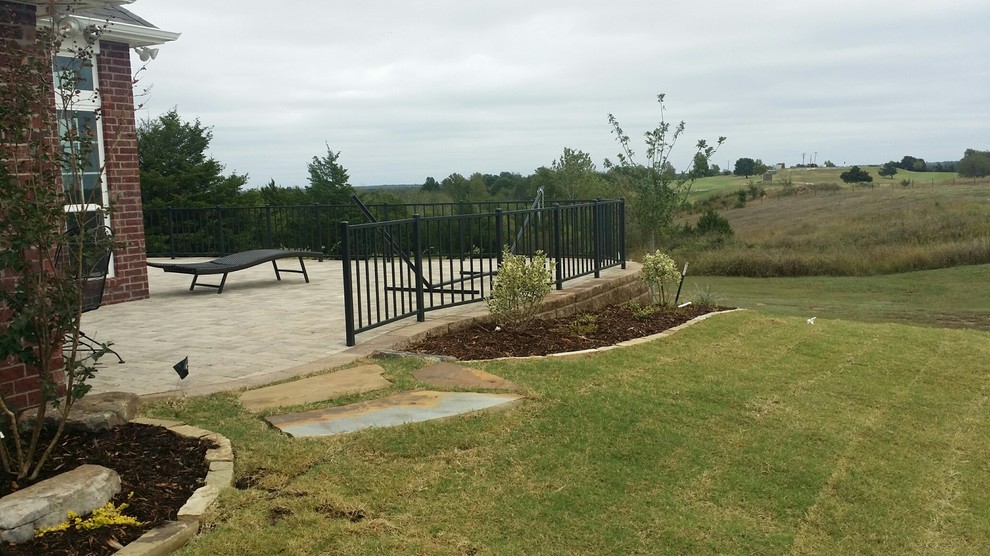 Example of a transitional home design design in Oklahoma City