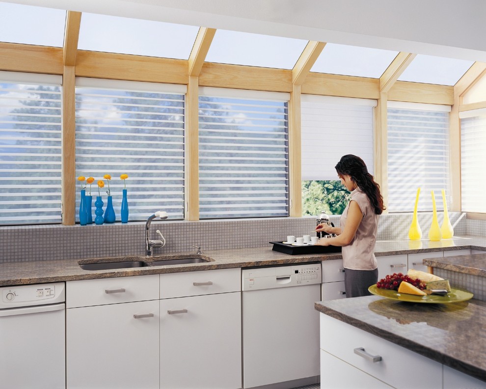 Mid-sized transitional u-shaped open concept kitchen photo in Edmonton with a double-bowl sink, raised-panel cabinets, white cabinets, granite countertops, gray backsplash, mosaic tile backsplash and stainless steel appliances