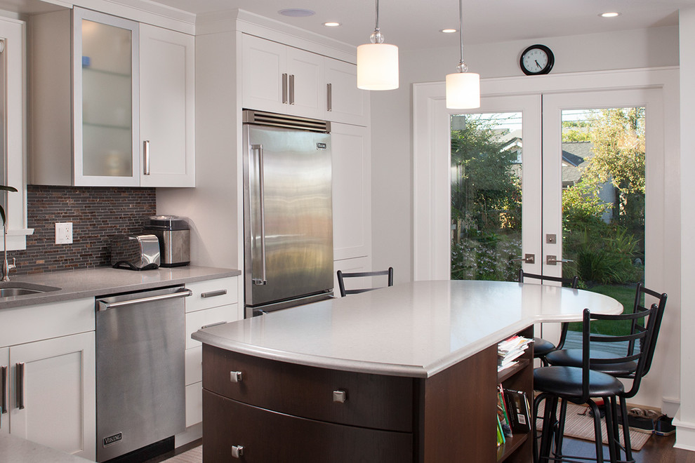 Example of a transitional kitchen design in Vancouver
