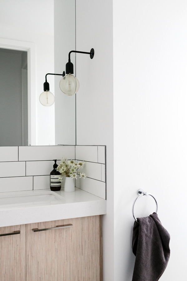 Photo of a beach style powder room in Melbourne.