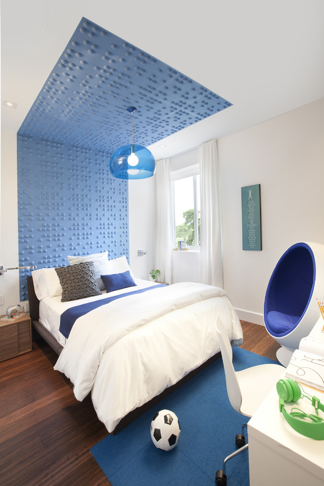 This is an example of a contemporary kids' room in Miami with multi-coloured walls.