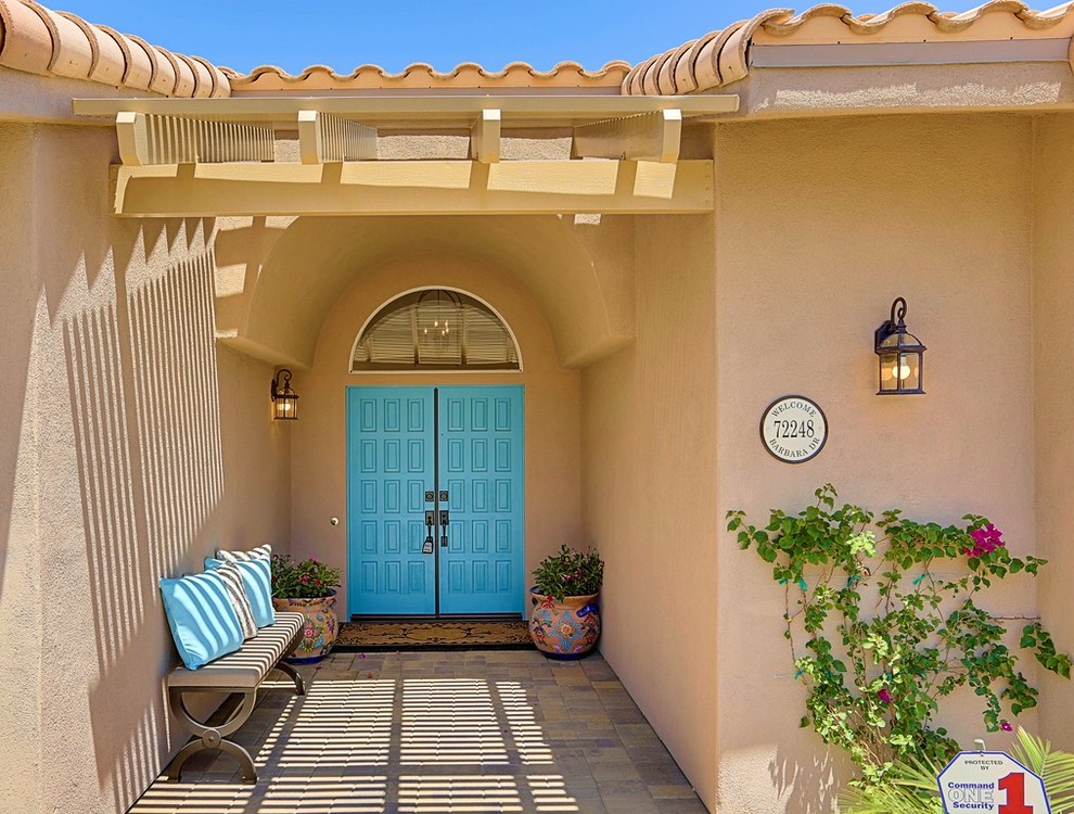 Inspiration for a front door in Los Angeles with a double front door and a blue front door.