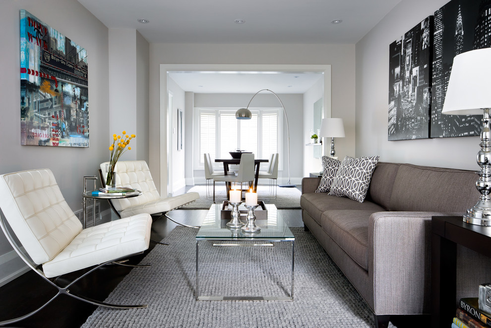 Inspiration for a mid-sized contemporary living room in Toronto with grey walls.
