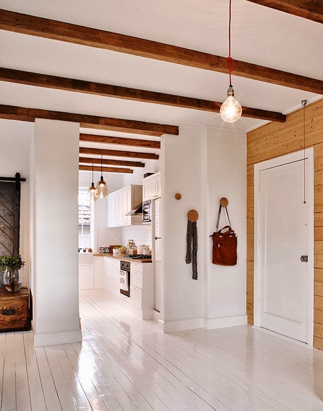 Inspiration for a scandinavian entryway in Sydney with white floor.