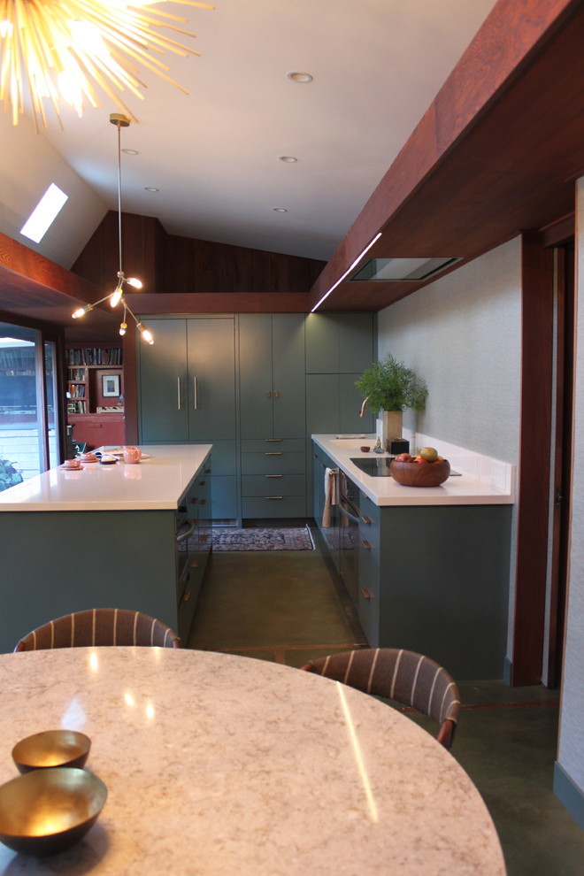 Example of a large mountain style galley eat-in kitchen design with quartz countertops and an island