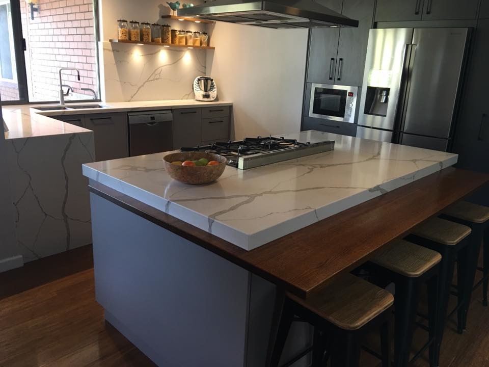 This is an example of a modern kitchen in Perth with an undermount sink and quartz benchtops.