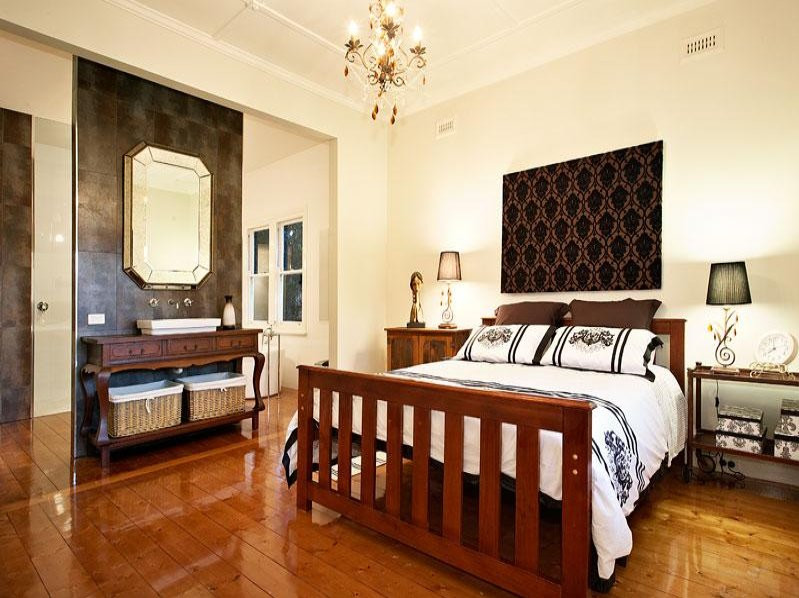 Contemporary master bedroom in Melbourne.