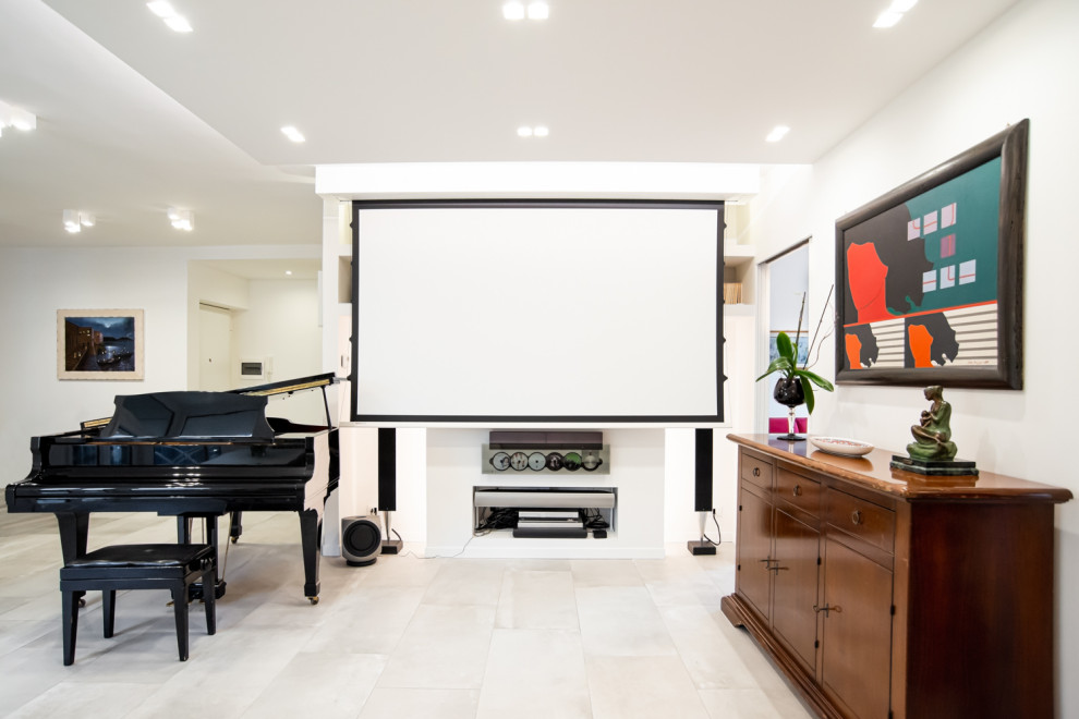 Photo of a contemporary open concept home theatre in Rome with white walls and a projector screen.