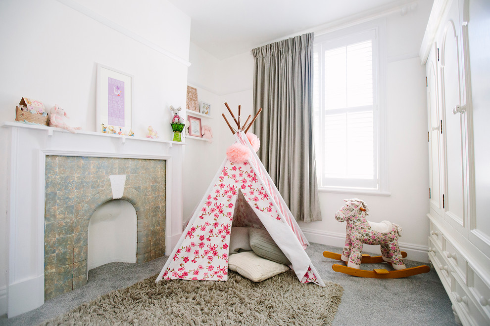 This is an example of a traditional kids' playroom for girls in London.