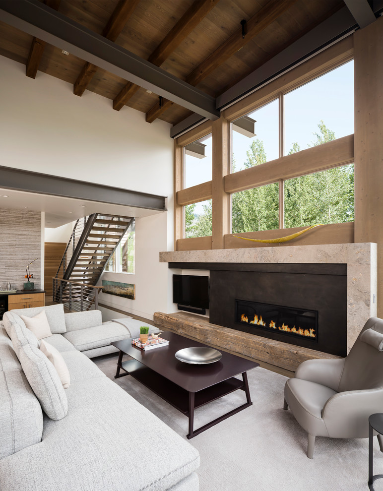 Living room - contemporary medium tone wood floor and white floor living room idea with white walls and a ribbon fireplace