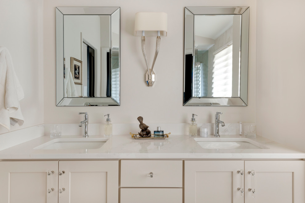 Example of a mid-sized transitional multicolored tile and porcelain tile porcelain tile, multicolored floor, double-sink and vaulted ceiling alcove shower design in Minneapolis with shaker cabinets, beige cabinets, a bidet, white walls, an undermount sink, quartz countertops, a hinged shower door, white countertops and a built-in vanity