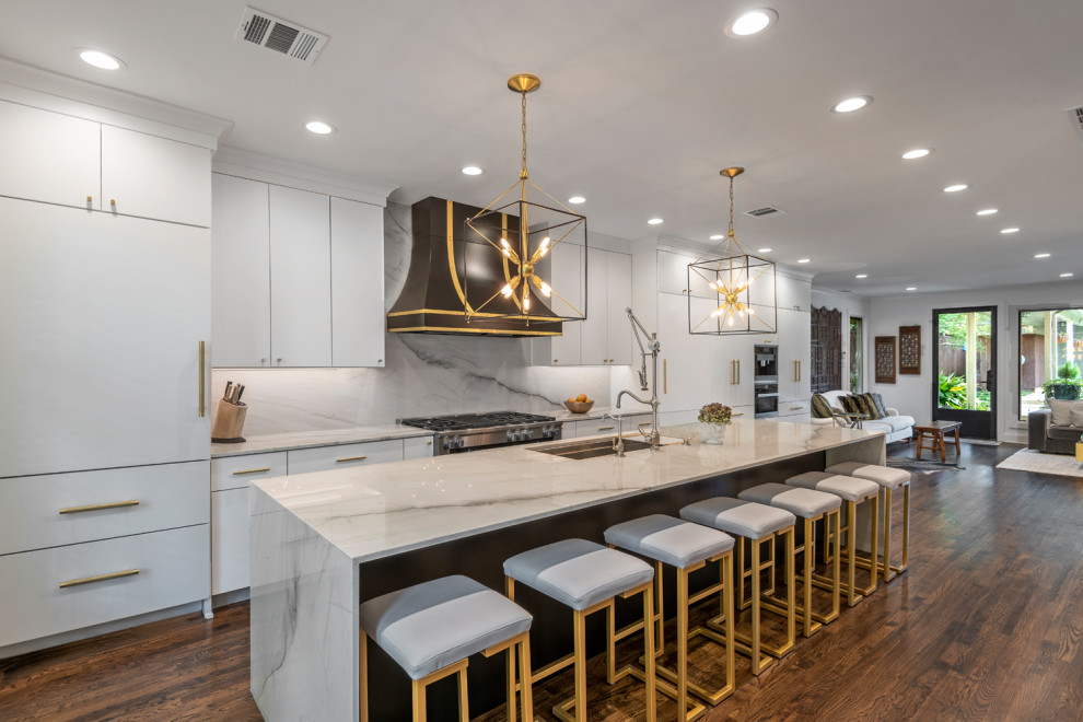 Contemporary kitchen in Dallas with quartzite benchtops, white splashback, stainless steel appliances and white benchtop.