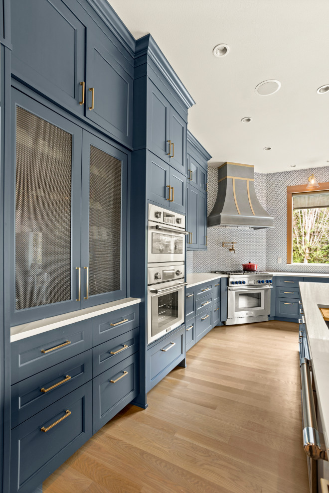 Example of a transitional kitchen design in Seattle