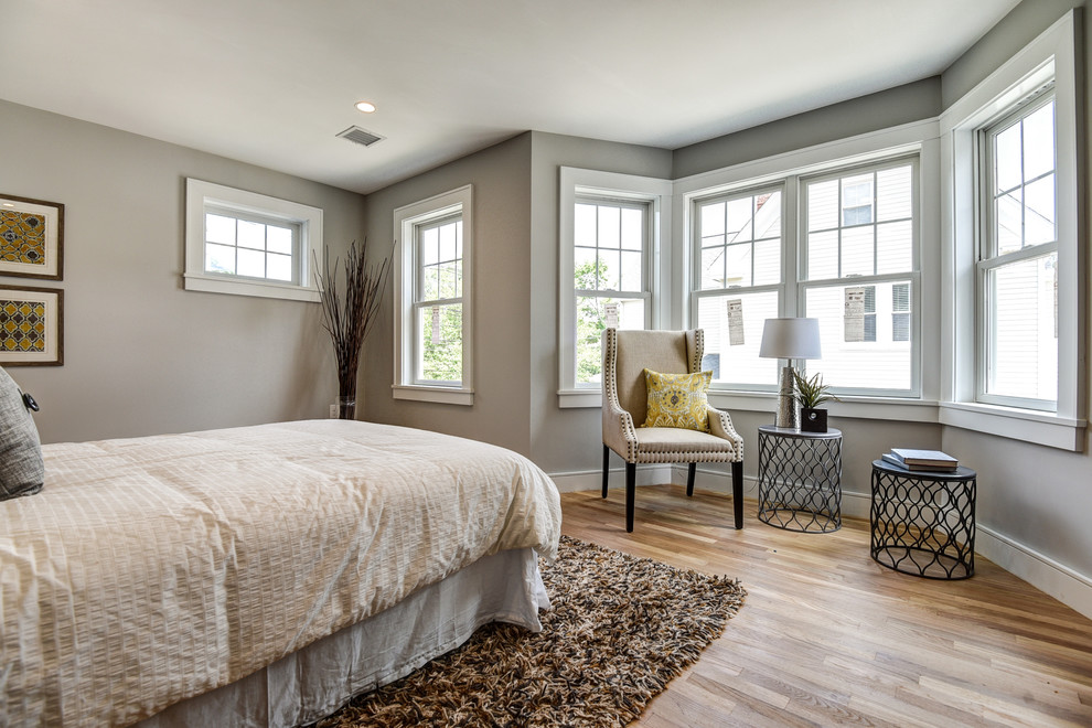 Design ideas for a large transitional master bedroom in Boston with grey walls, light hardwood floors and no fireplace.