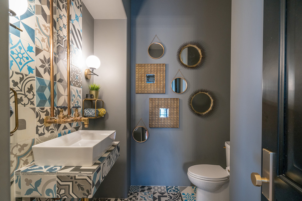 Design ideas for a contemporary powder room in Phoenix with multi-coloured tile, grey walls, a vessel sink, tile benchtops, multi-coloured floor and multi-coloured benchtops.