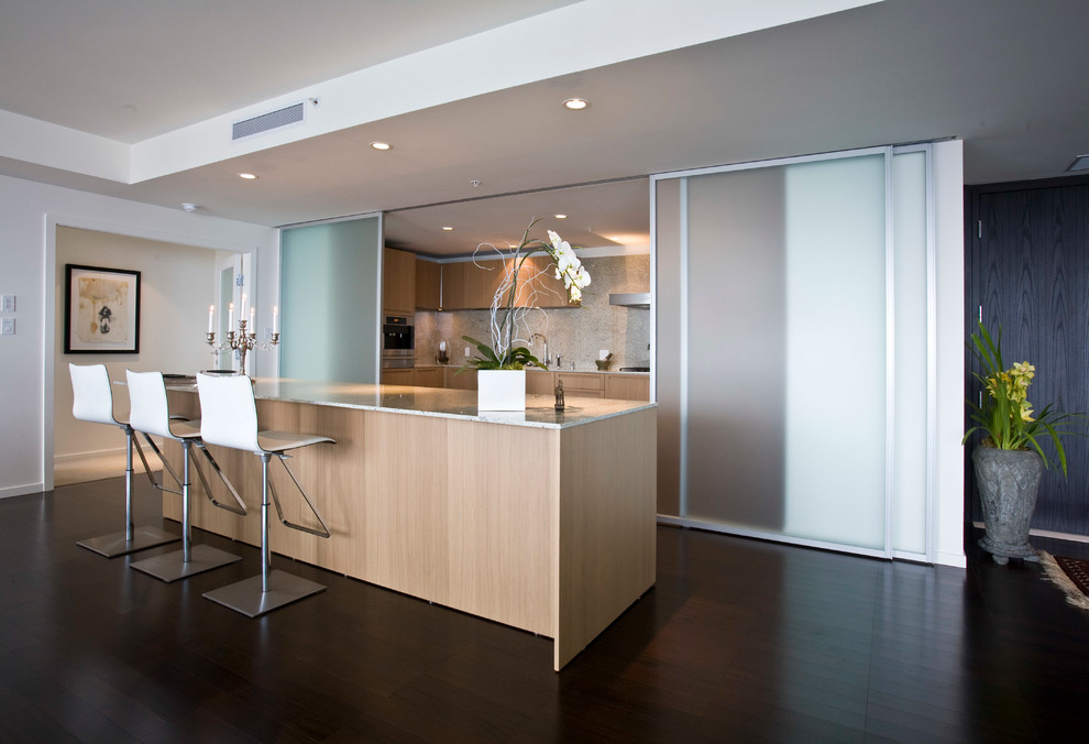 Contemporary separate kitchen in Vancouver with flat-panel cabinets and light wood cabinets.