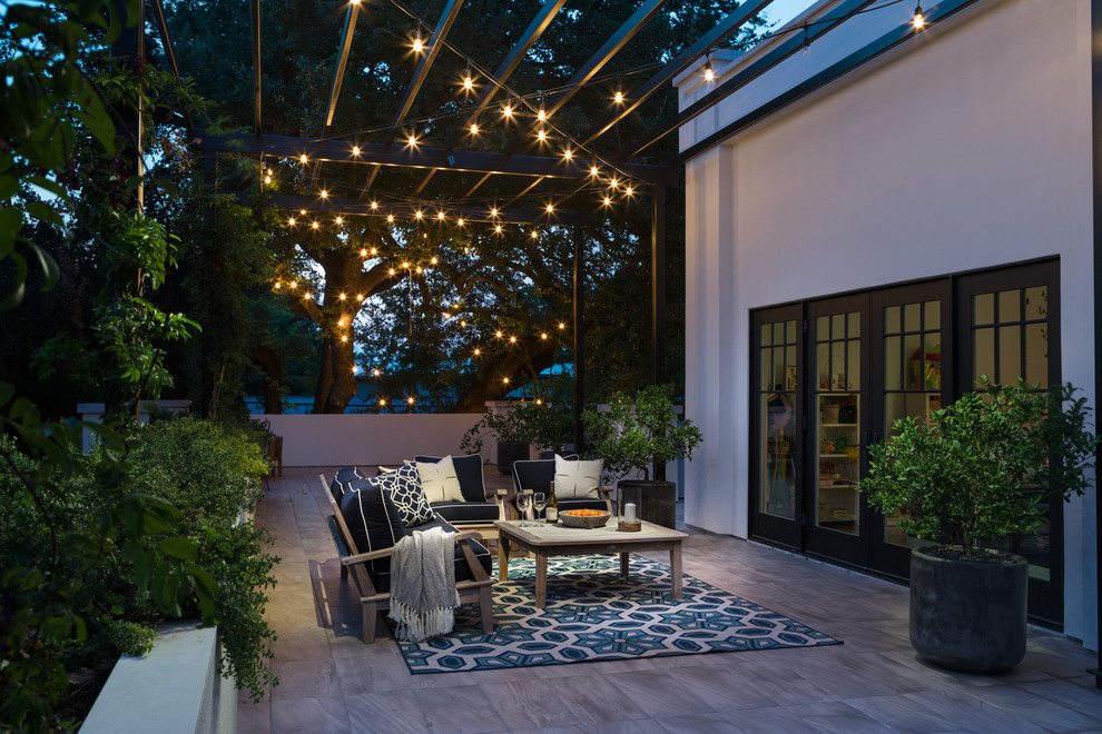 Photo of a transitional backyard patio in Austin.