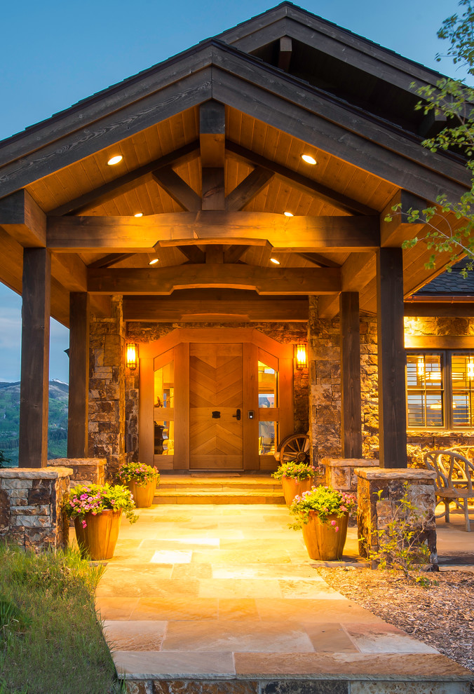 Inspiration for a large rustic front door remodel with a medium wood front door