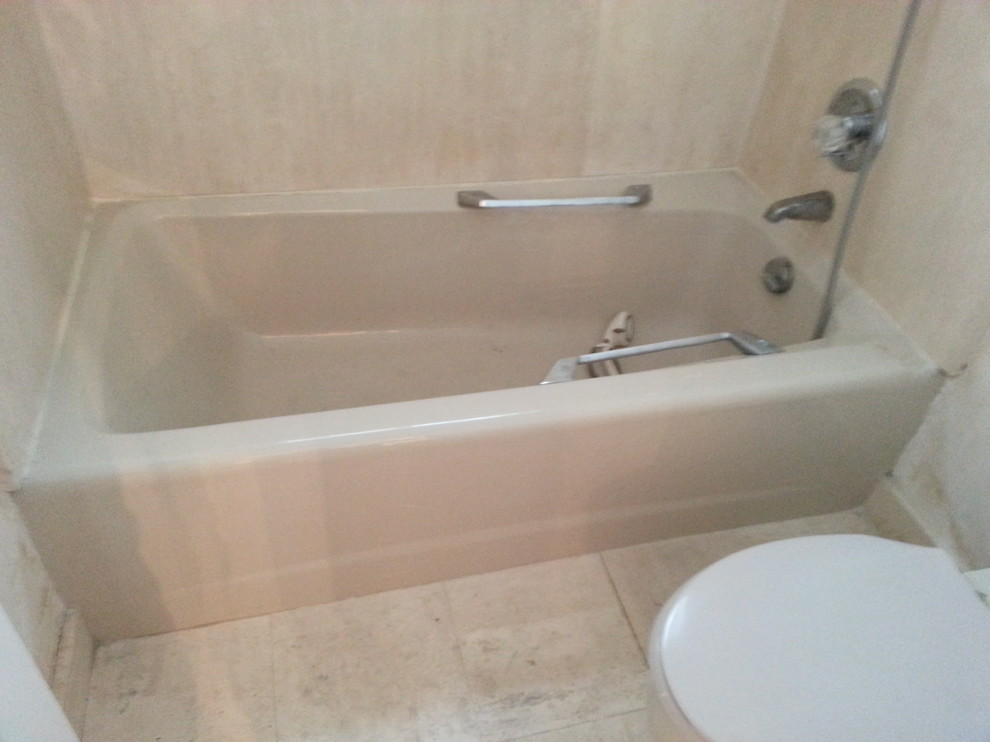 Help! Can I remove a tub without damaging cultured marble walls?