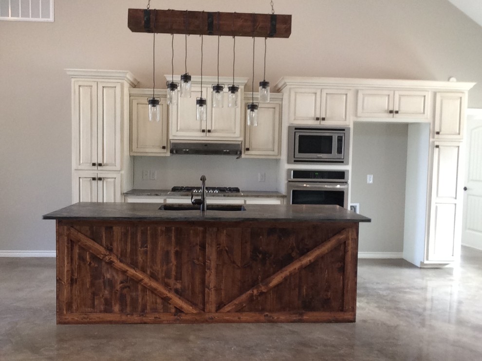 Photo of a rustic kitchen in Houston.