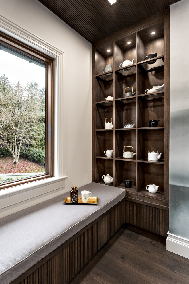 Inspiration for a traditional cloakroom in Vancouver with dark hardwood flooring and brown floors.
