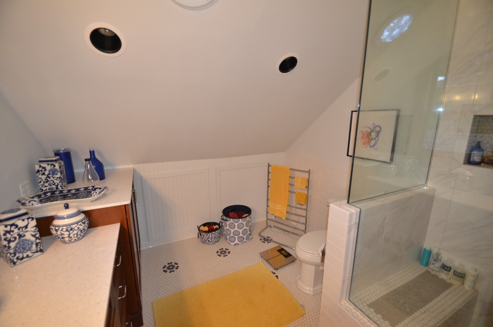Small transitional master white tile and ceramic tile ceramic tile bathroom photo with recessed-panel cabinets, dark wood cabinets, a two-piece toilet, white walls, an undermount sink and quartz countertops