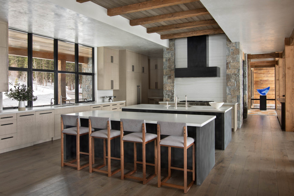Kitchen - rustic exposed beam and dark wood floor kitchen idea with two islands and white countertops