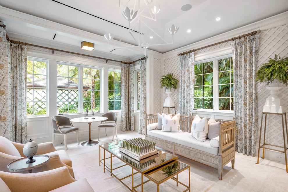 Design ideas for an expansive world-inspired conservatory in Miami with feature lighting, limestone flooring and beige floors.