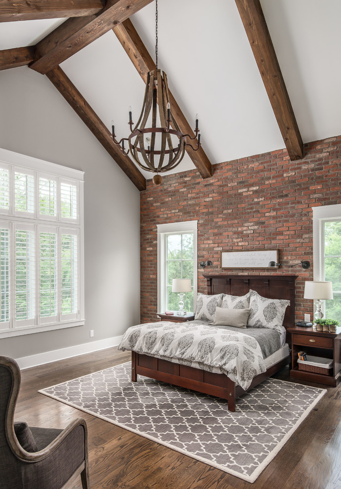 Inspiration for a traditional master bedroom in Nashville with grey walls and dark hardwood floors.
