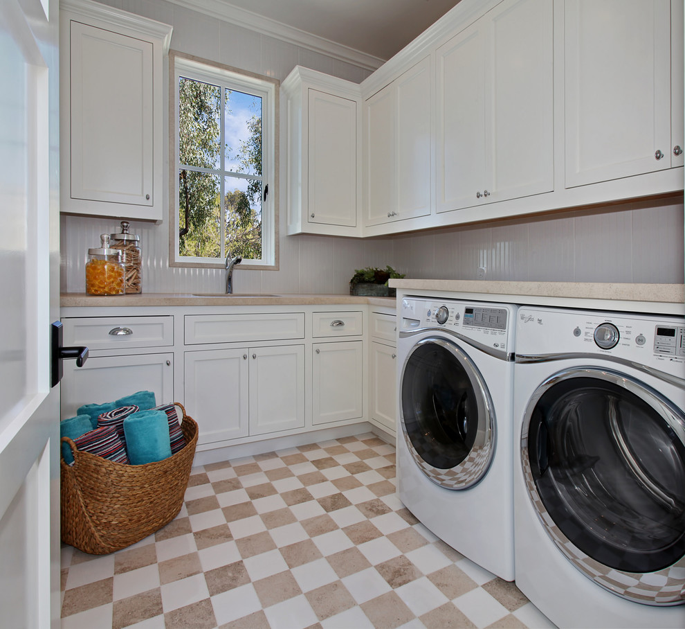 Beach style laundry room in Orange County.