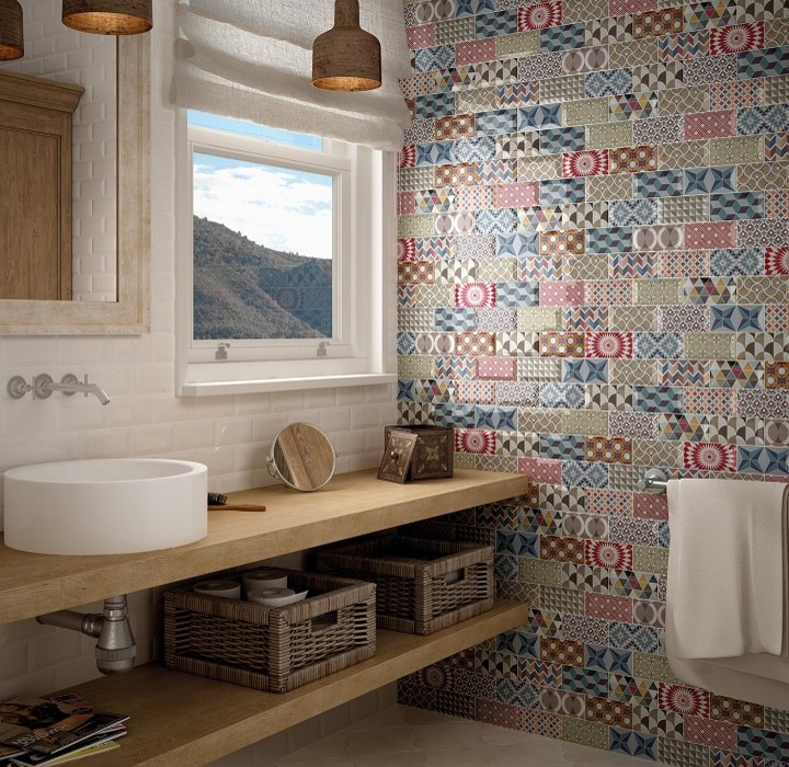 Example of a mid-sized transitional master multicolored tile and porcelain tile porcelain tile claw-foot bathtub design in Orange County with open cabinets, light wood cabinets, a one-piece toilet, multicolored walls, a vessel sink and quartz countertops