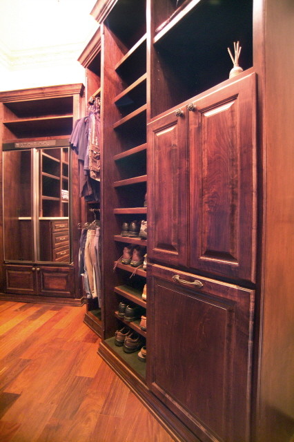 This is an example of a traditional storage and wardrobe in Tampa.