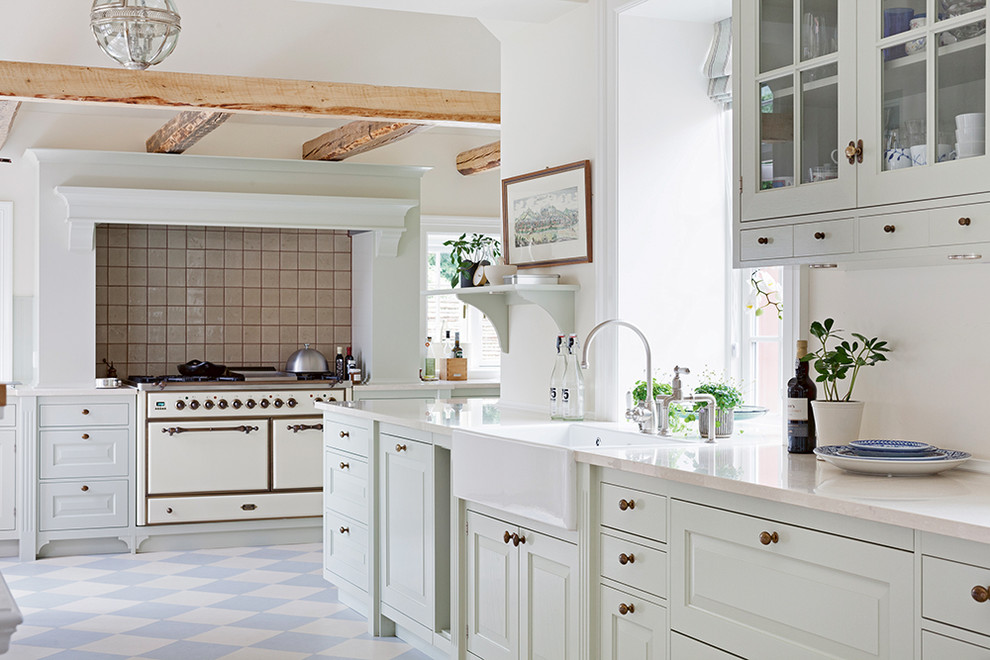 Design ideas for a large traditional kitchen in Copenhagen with beaded inset cabinets, white cabinets, linoleum floors and multi-coloured floor.