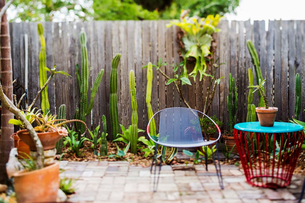 Design ideas for an eclectic patio in Sydney.
