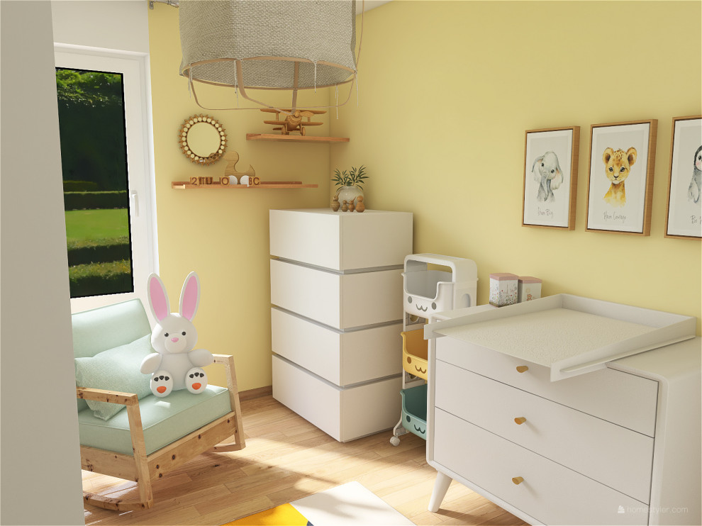 This is an example of a small contemporary gender neutral nursery in Paris with yellow walls.