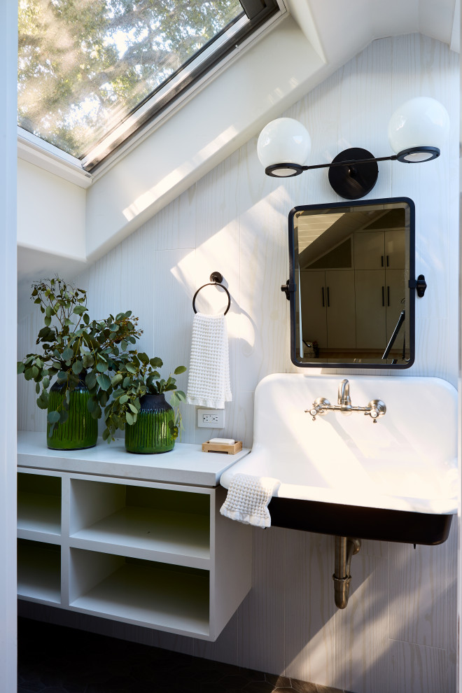 Design ideas for a traditional bathroom in San Francisco with brown cabinets, white tile, wood-look tile, white walls, a wall-mount sink, quartzite benchtops, white benchtops, a single vanity and vaulted.
