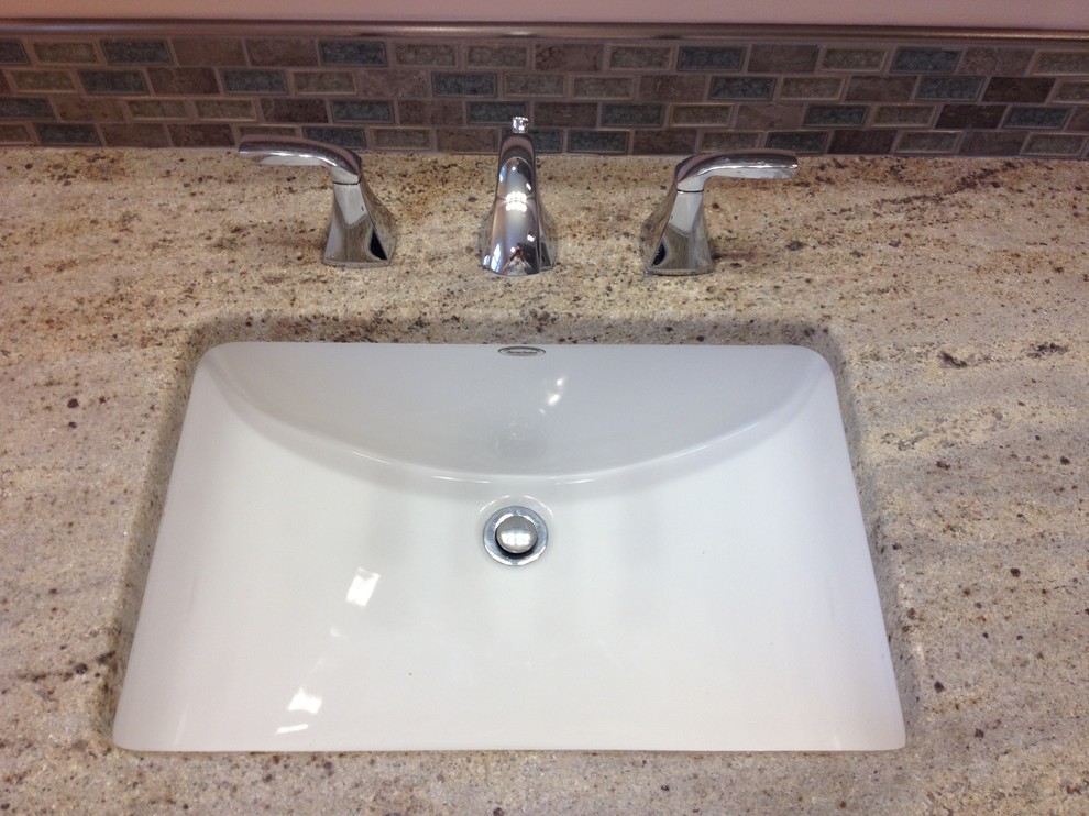 Inspiration for a mid-sized transitional kids' gray tile and porcelain tile porcelain tile home design remodel with an undermount sink, raised-panel cabinets, white cabinets, granite countertops and orange walls