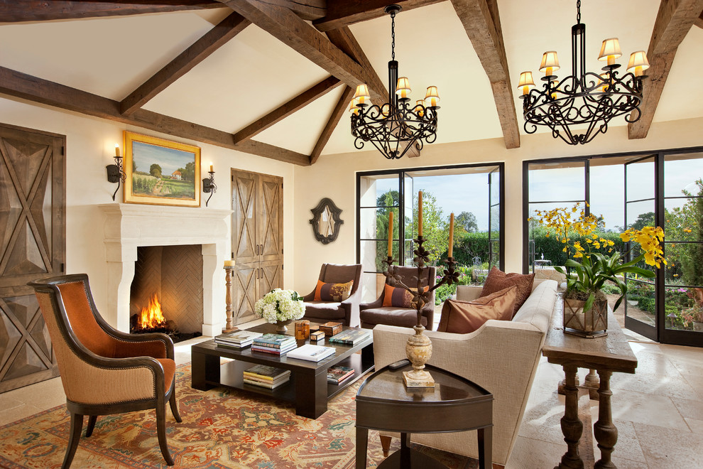 This is an example of a living room in Santa Barbara with a standard fireplace.
